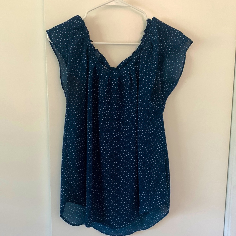 Short sleeve blouse. Navy blue with minimal pink, white, and blue design